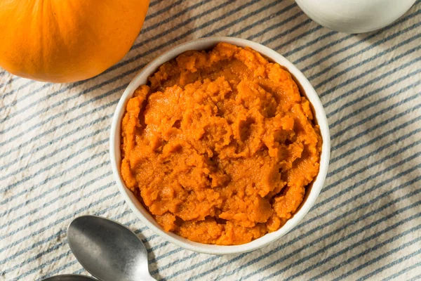 stock image Organic Raw Orange Pumpkin Puree in a Bowl