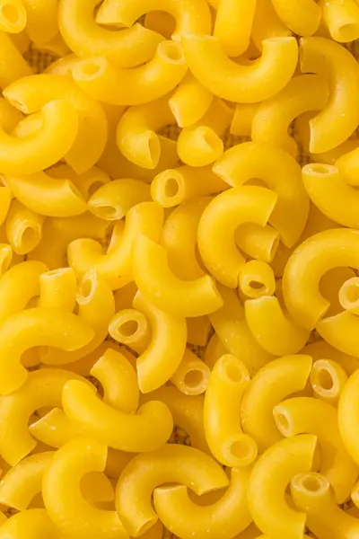 Raw Organic Uncooked Macaroni Noodles Bowl — Stock Photo, Image