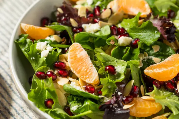 Raw Organic Healthy Winter Salad with Oranges Feta and Almonds