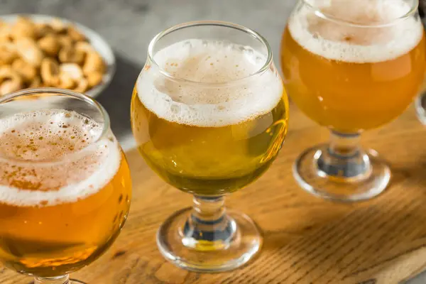 Boozy Cold Refreshing Craft Beer Flight Peanuts — Stockfoto