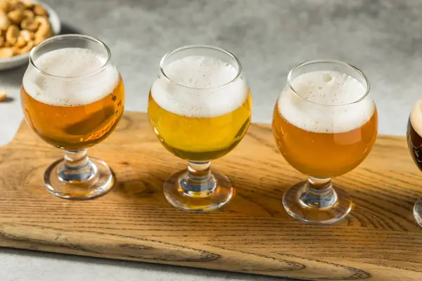 Boozy Cold Refreshing Craft Beer Flight Peanuts — Stock Photo, Image