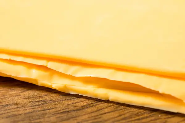 Yellow Cheddar American Cheese Singles Stack Stock Picture