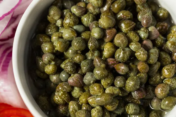 stock image Organic Marinated Green Capers in a Bowl