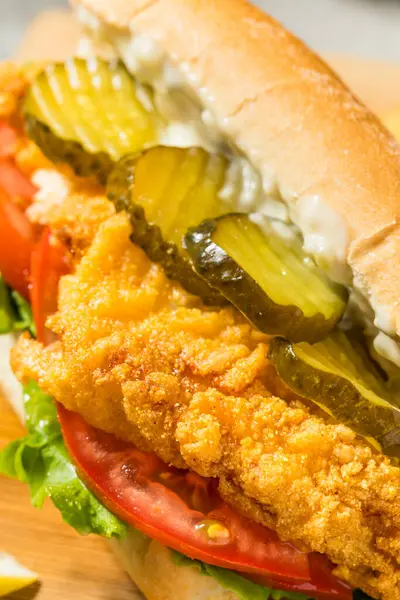 stock image Southern Homemade Catfish Poboy Sandwich with Lettuce Tomato and Pickle