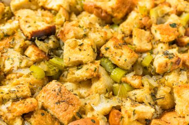 Homemade Thanksgiving Turkey Stuffing Dressing with Celery Onions and Garlic clipart