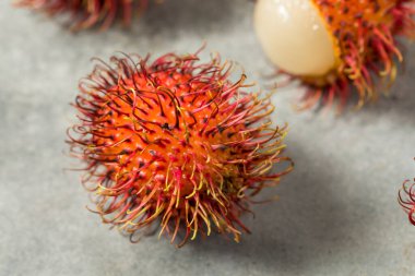 Organic Raw Red Thai Rambutan Tropical Fruit Ready to Eat clipart