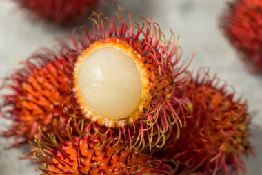 Organic Raw Red Thai Rambutan Tropical Fruit Ready to Eat clipart