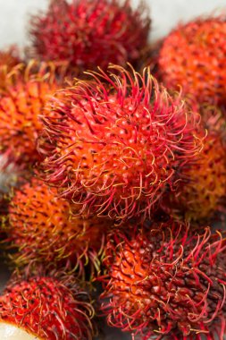 Organic Raw Red Thai Rambutan Tropical Fruit Ready to Eat clipart