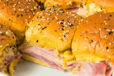 Homemade Ham and Cheese Sliders for a Party with Mustard clipart