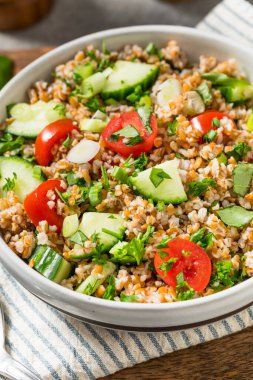 Healthy Homemade Mediterranean Bulgar Wheat Salad with Tomato and Cucumber