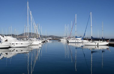 Port Cogolin winter day with mountain view yacht dock