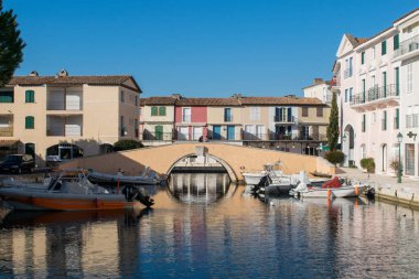 Port grimaud hotels boats and river day time