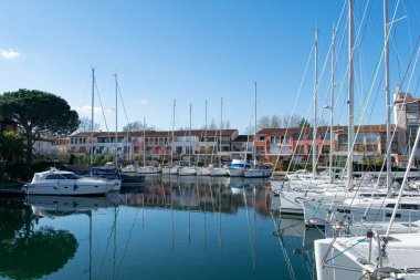 Port grimaud hotels boats and river day time