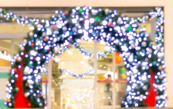 Lampu Bokeh Natal Mengaburkan Dekorasi Lengkungan Untuk Latar Belakang Festival — Stok Foto