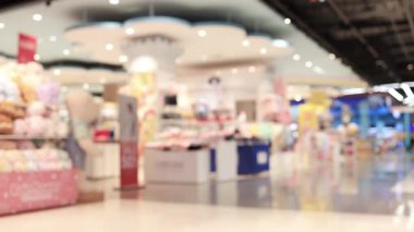 İç görünümü olan soyut manzara alışveriş merkezi arka planı, sergi bulanıklığı, modern lüks mağazalarda yürüyen pazar, fuar salonu etkinliği ve güzel Bokeh 'li alışveriş merkezi