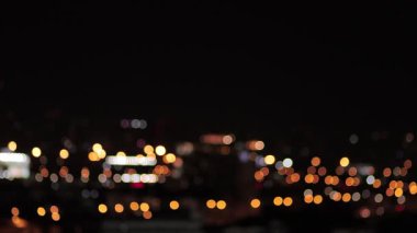 Şehir gece lambası renkli bulanık efektli. Bokeh gece lambası. Arka planlar için mükemmel, modern şehir havası, romantik, rüya gibi ve sanatsal atmosfer