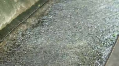 water in a concrete drainage channel, representing wastewater management, polluted water, environmental issues, urban drainage system, concrete channel for waste water treatment, sewage treatment