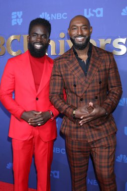 LOS ANGELES - JAN 15:  Jimmy Akingbola, Adrian Holmes at NBCUniversal Press Tour Red Carpet at the Langham Pasadena Hotel  on January 15, 2023 in Pasadena, CA