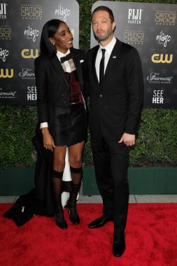 LOS ANGELES - JAN 15:  Ayo Edebiri, Ebon Moss-Bachrach at 2023 Critics Choice Awards - Arrivals at the Fairmont Century Plaza on January 15, 2023 in Century City, CA