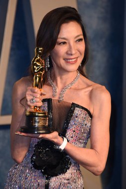 LOS ANGELES - MAR 12:  Michelle Yeoh at the 2023 Vanity Fair Oscar Party at the Wallis Annenberg Center for the Performing Arts on March 12, 2023 in Beverly Hills, CA clipart