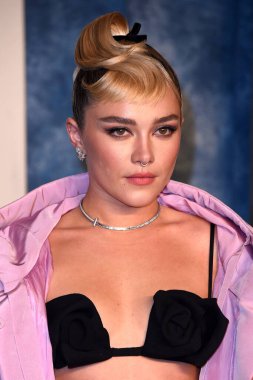LOS ANGELES - MAR 12:  Florence Pugh at the 2023 Vanity Fair Oscar Party at the Wallis Annenberg Center for the Performing Arts on March 12, 2023 in Beverly Hills, CA clipart