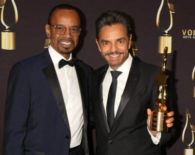 LOS ANGELES - DEC 9:  Rudy Gaskins, Eugenio Derbez at the 10th Annual Society of Voice Arts and Sciences Voice Awards Gala Winners Circle at the Beverly Hilton Hotel on December 9, 2023 in Beverly Hills, CA clipart