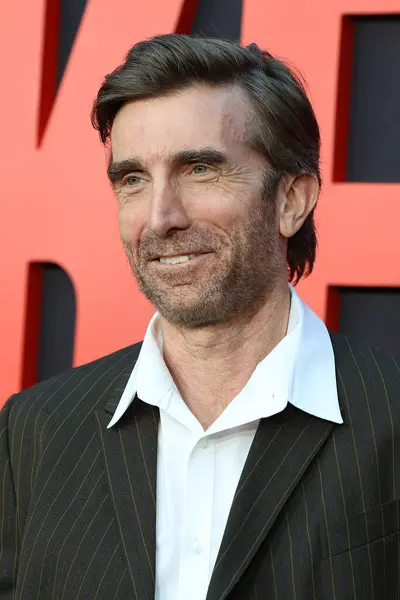 Stock image LOS ANGELES - APR 4: actor Sharlto Copley at the Monkey Man Los Angelesw Premiere at the TCL Chinese Theater IMAX on April 4, 2024 in Los Angeles, CA