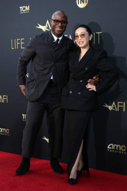 LOS ANGELES, USA - APRIL 27:  Barry Jenkins, Lulu Wang at the AFI Lifetime Achievement Awards IHO Nicole Kidman at the Dolby Theater on April 27, 2024 in Los Angeles, CA clipart