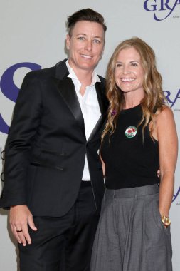 LOS ANGELES, USA - MAY 21, 2024:  Glennon Doyle, Abby Wambach at the 2024 Gracie Awards at the Beverly Wilshire Hotel on May 21, 2024 in Beverly Hills, CA clipart