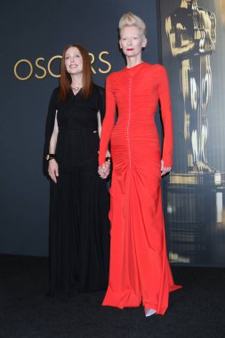 LOS ANGELES, USA - NOVEMBER 17, 2024:  Julianne Moore, Tilda Swinton at the 2024 Governors Awards at Dolby Ballroom on November 17, 2024 in Los Angeles, CA clipart