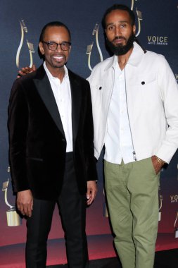 SAN DIEGO, USA - DECEMBER 8, 2024:  Rudy Gaskins, Ngozi Gaskins at the 11th SOVAS Awards Winners Circle at Beverly Hilton Hotel on December 8, 2024 in Beverly Hills, CA clipart