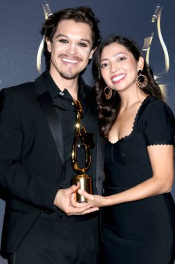 SAN DIEGO, USA - DECEMBER 8, 2024: Eddy De Los Reyes, Kana Shimanuki at the 11th SOVAS Awards Winners Circle at Beverly Hilton Hotel on December 8, 2024 in Beverly Hills, CA clipart