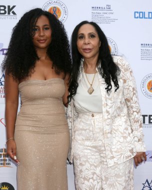 Milan Tyson, Dr. Rita Ali 13 Ağustos 2025 'te 11301 W. Olimpiyat Bulvarı' ndaki 100 Kadın Meselesi Galasında, CA