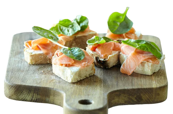 Selection Tasty Bruschetta Canapes Salmon Closeup Isolated Wooden Board — Stock Photo, Image