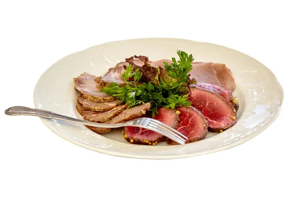 stock image Appetizer plate with a meat selection. Sliced baked ham. Isolated