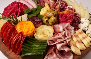 Appetizers boards with assorted cheese, salami, ham, grape and nuts. Charcuterie and cheese platter. Top view. Isolated. clipart