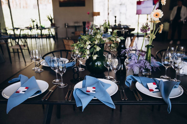 Banquet Tables Decorated Flowers Dishes Tables Blue Napkins Glasses Colorful Stock Picture