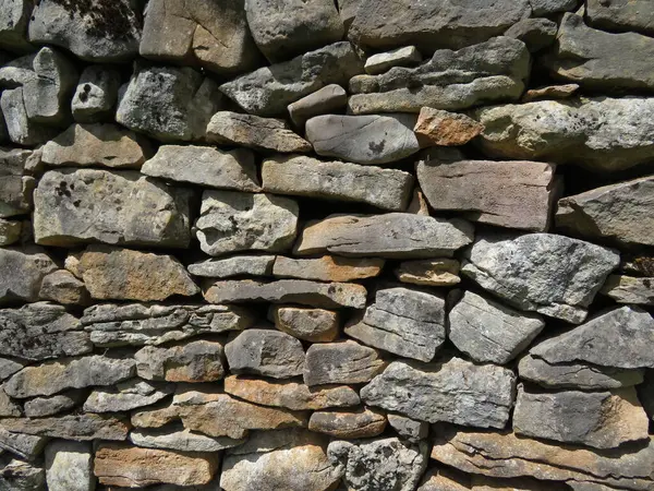 Taş duvar antika mimarisi. Dayanıklı, dayanıklı bir işçilik.