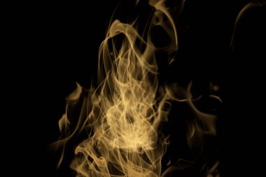 Realistic black background flame texture.
