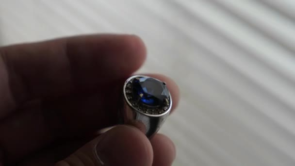 Close Man Holding Clue Stone Silver Ring Check Its Quality — Stockvideo