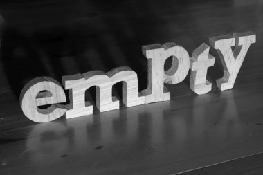 Empty, text words typography written with wooden letter on black background, life and business negativity concept