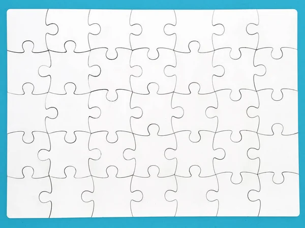 Weißes Puzzle Auf Blauem Hintergrund Layout Der Ansicht Von Oben — Stockfoto