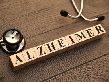 Alzheimer, ahşap harf, sağlık ve tıbbi konsept ile yazılmış yazı tipi