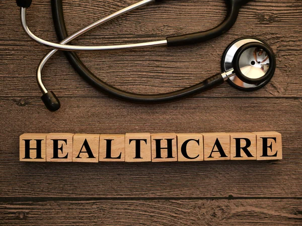 Υγειονομική Περίθαλψη Κείμενο Λέξεις Τυπογραφία Γραμμένο Ξύλινη Επιστολή Την Υγεία — Φωτογραφία Αρχείου