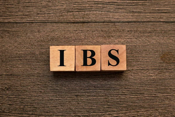 stock image IBS irritable bowel syndrome, text words typography written on wooden letter, health and medical concept