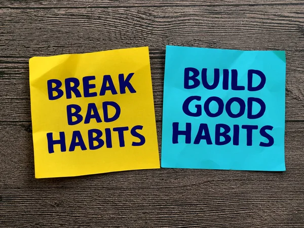 Break bad habits, build good habits, text words typography written on paper, life and business motivational inspirational concept