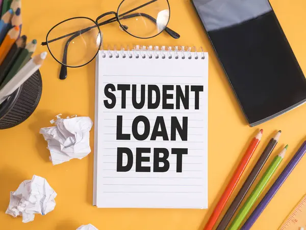 Student loan debt, text words typography written on paper, life and educational concept