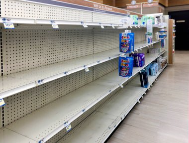 Bronx, New York - December 28, 2022: Empty shelves at a local Rite Aid store with merchandise hidden to avoid theft. 