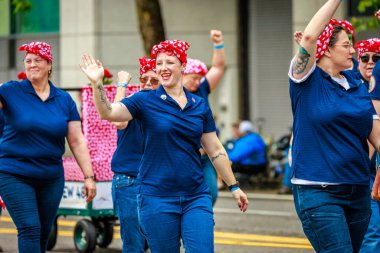 Portland, Oregon, USA - June 11, 2022: IBEW Local 48 in the Grand Floral Parade, during Portland Rose Festival 2022.