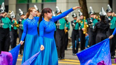 Portland, Oregon, USA - June 11, 2022: Century High School Marching Band in the Grand Floral Parade, during Portland Rose Festival 2022.
